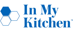 Logo with two blue hexagons and one outlined hexagon next to the text "In My Kitchen" in blue font on a light background.